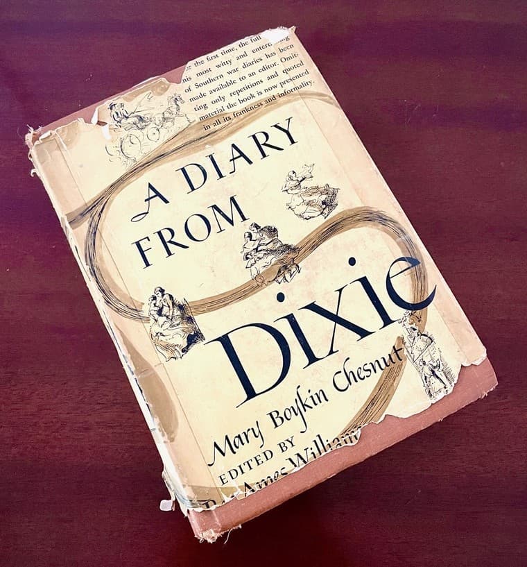 The cover of "A Diary from Dixie" by Mary Boykin Chesnut, featuring intricate illustrations and visible wear.